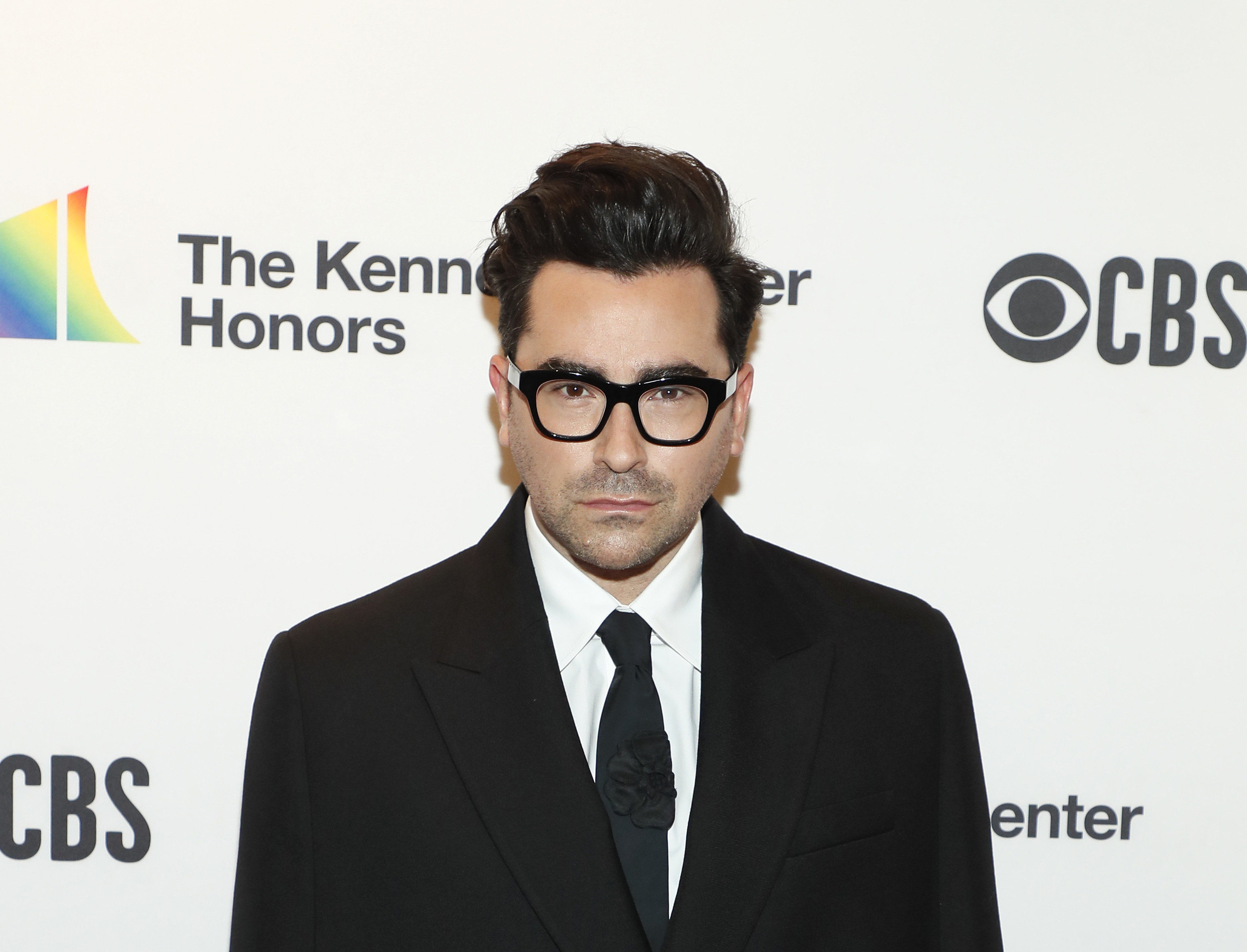 Dan Levy looking into the camera