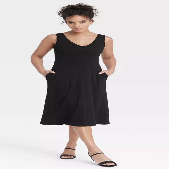 front view of model wearing the dress in black