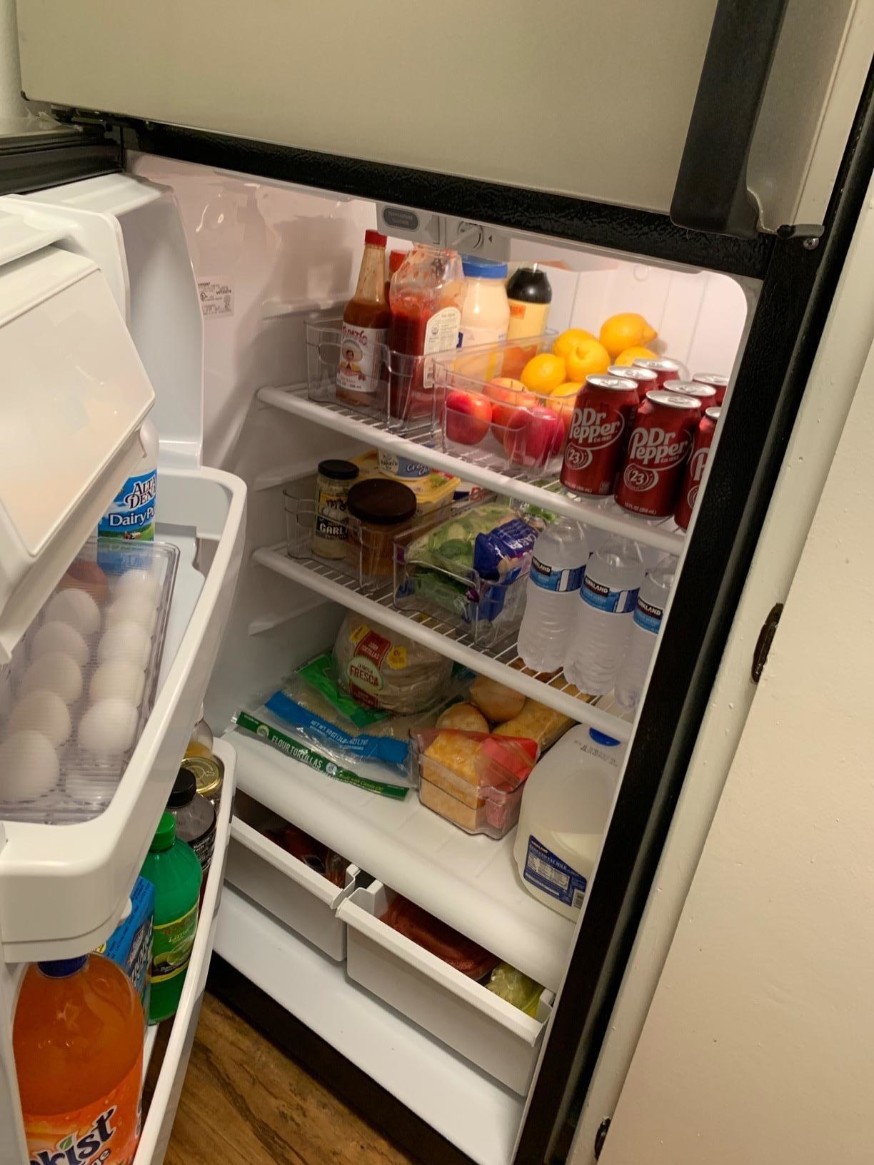 reviewer image of the organizing bins in a fridge