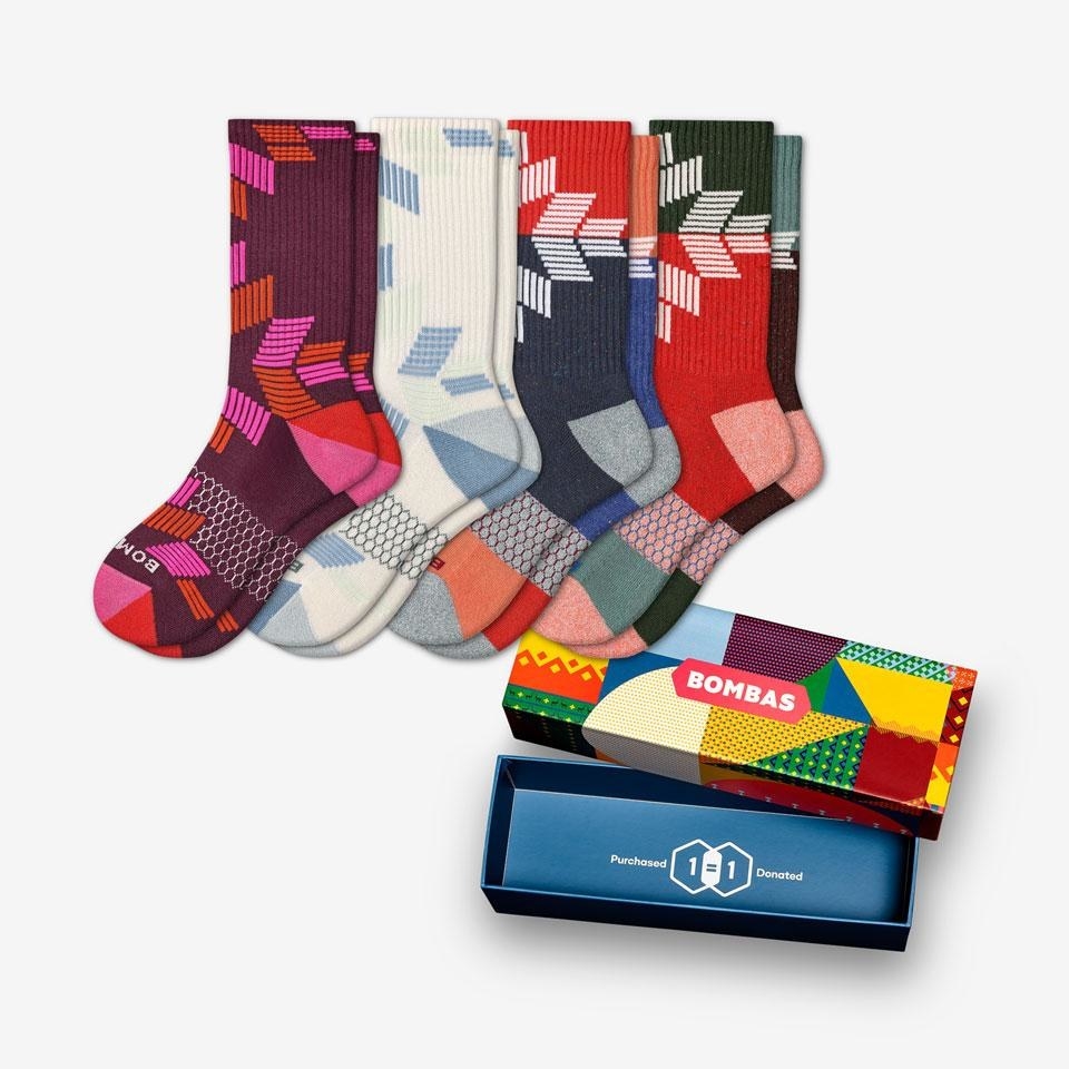 four snowflake-patterned crew socks
