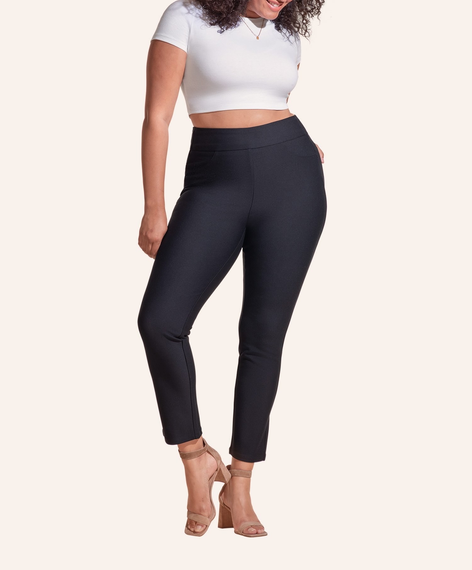 A model in the high waisted black pants