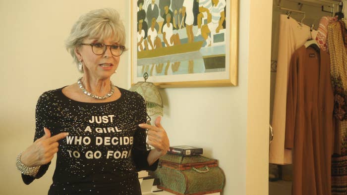 Rita wearing a shirt that says "Just a girl who decided to go for it"