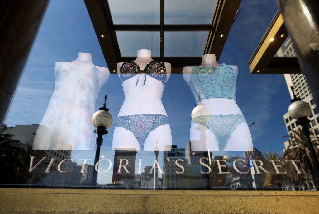 Three mannequins in a Victoria&#x27;s Secret window.