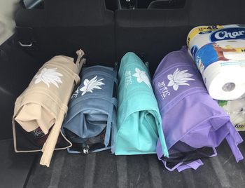 The bags rolled up in the back of someone's car