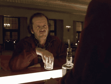 Jack Nicholson swirling a whiskey glass.
