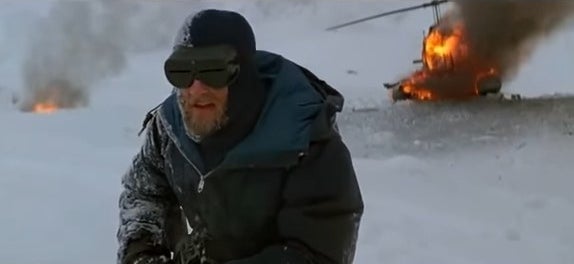 The Norwegian with his helicopter burning in the background in &quot;The Thing&quot; (1982)