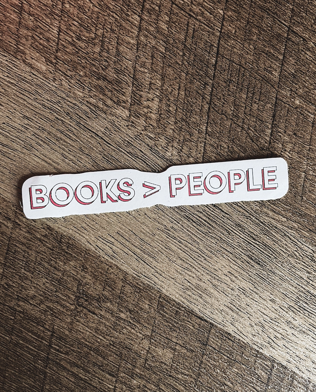 sticker that reads books &amp;gt; people