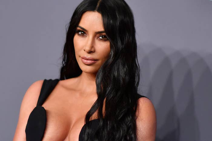 Kim posing at a red carpet event
