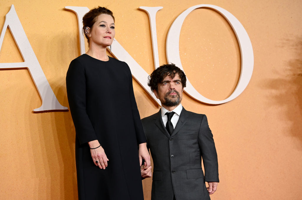 Peter Dinklage and Erica Schmidt posing at the Cyrano premiere