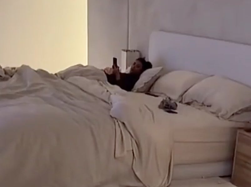 A closeup of Kim in bed