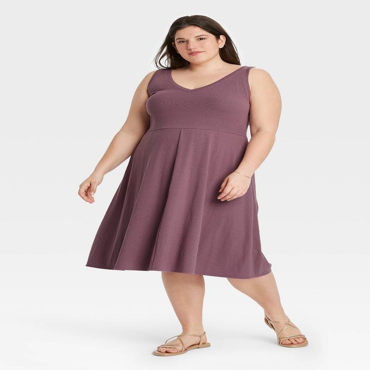 back view of model wearing the dress in purple