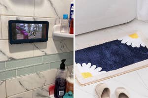Reviewer photo of their phone playing video inside a shower phone mount / Dark blue daisy bathmat in front of a bathtub