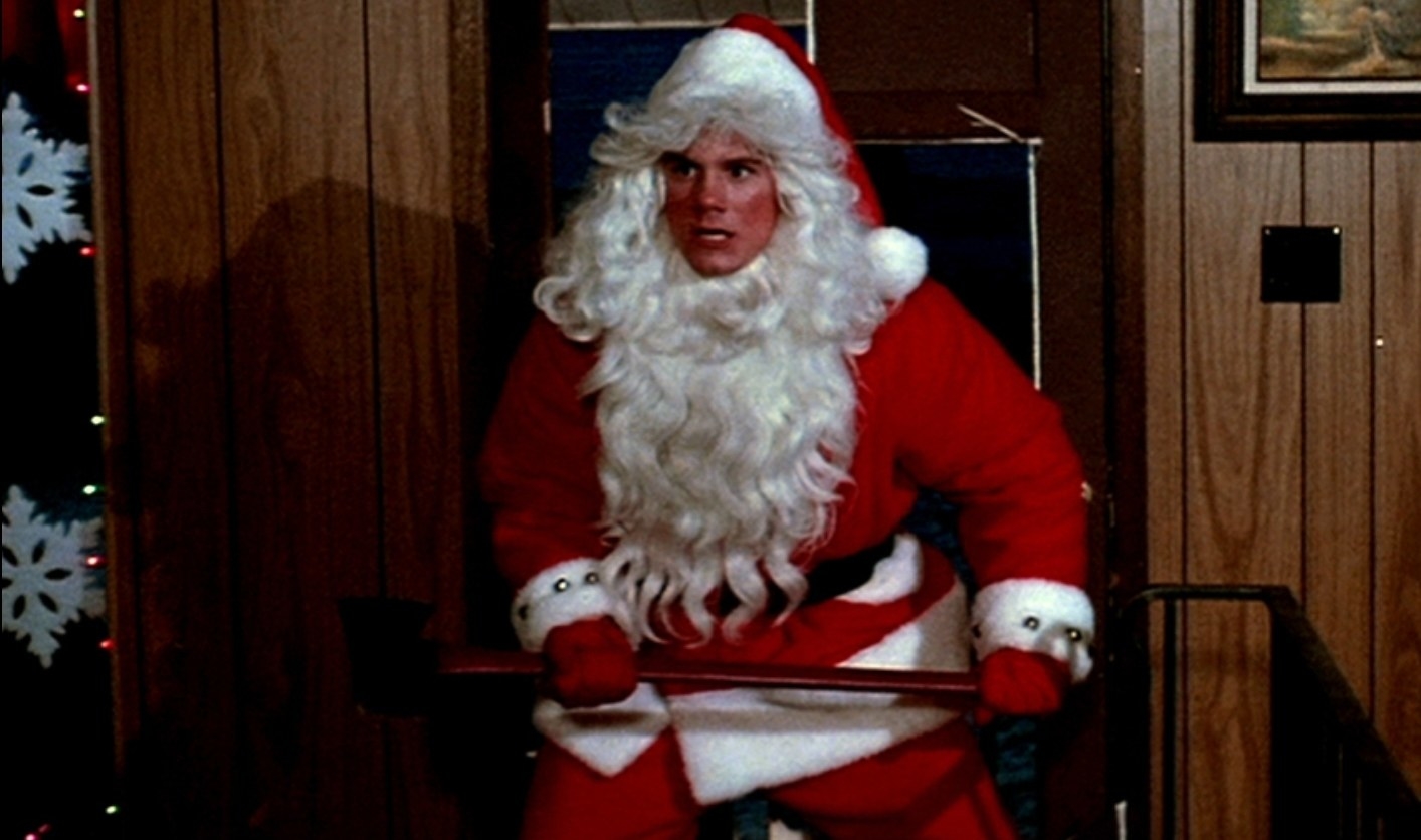 Billy Chapman (Robert Brian Wilson) in a Santa suit, holding an axe in &quot;Silent Night, Deadly Night&quot;