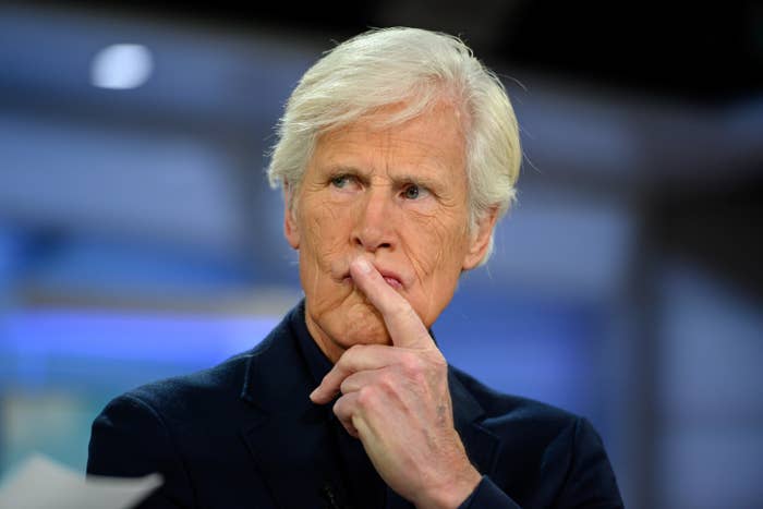 Keith Morrison deep in thought with his index finger held up to his mouth