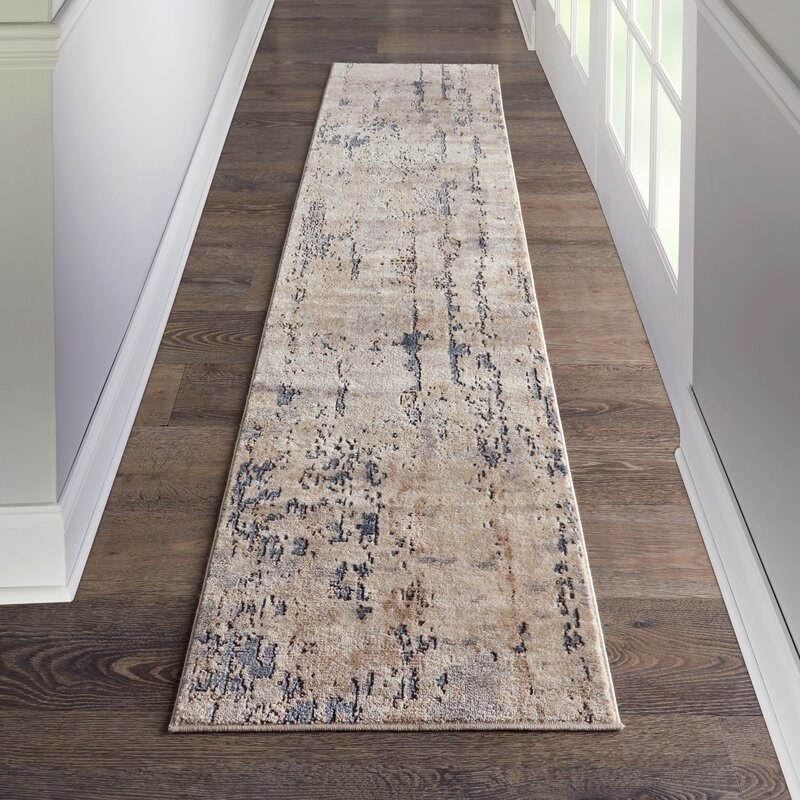 The hallway rug in a hallway