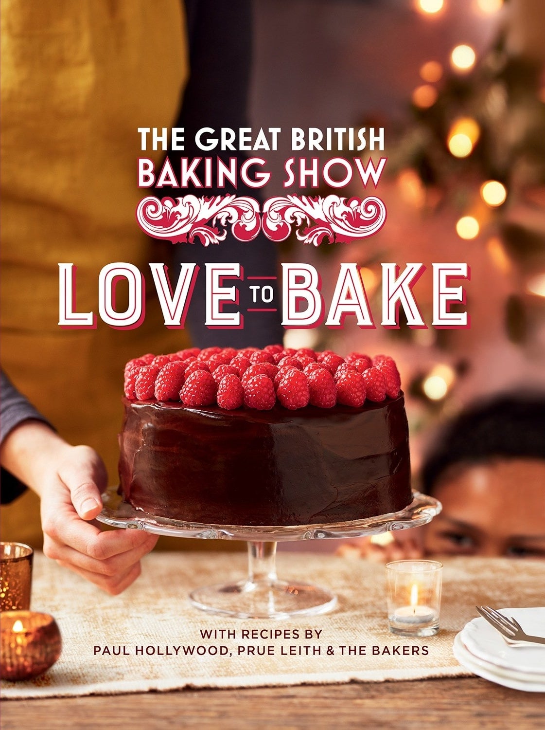 the cover, which has a chocolate cake with raspberries on it