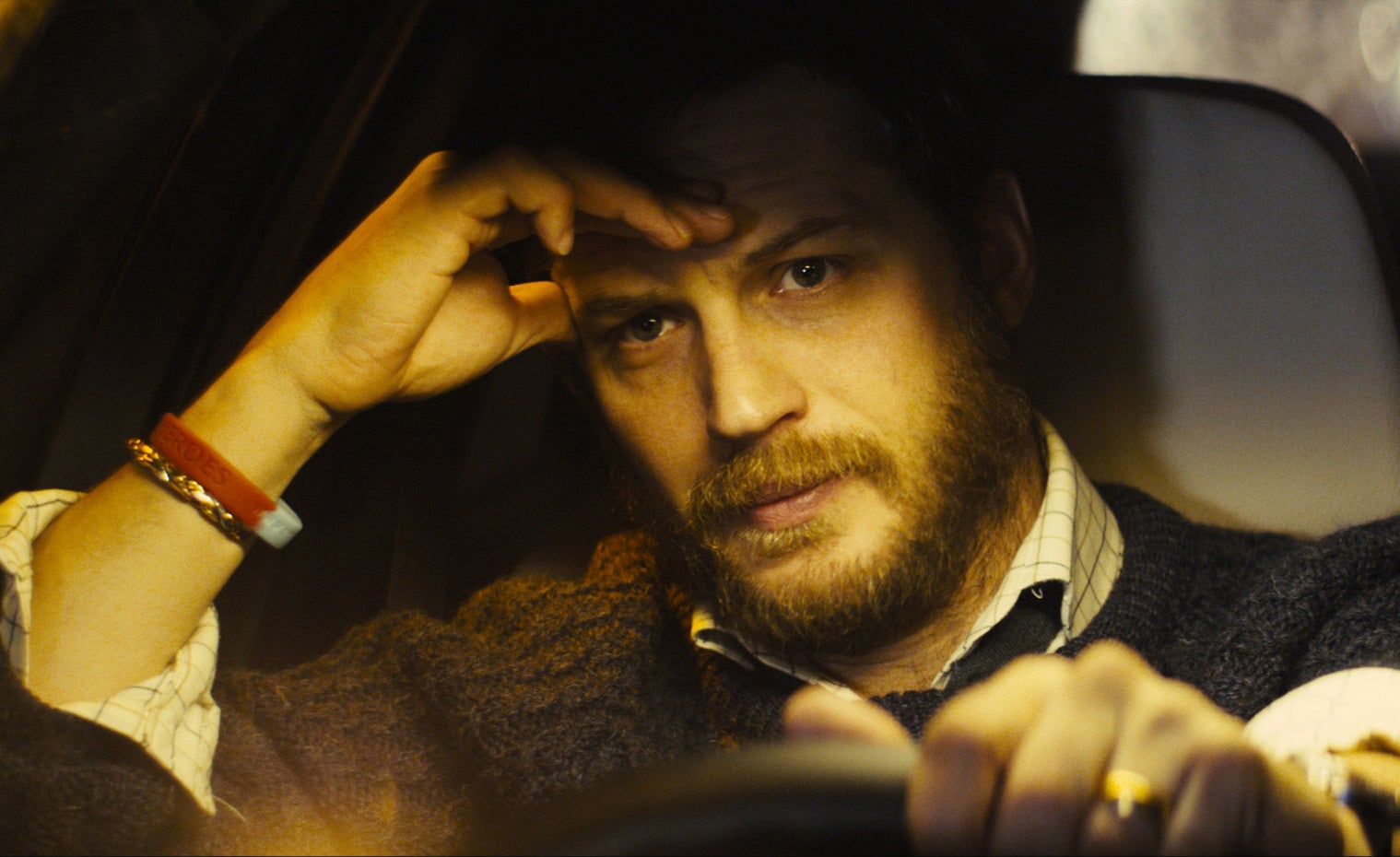 Tom Hardy looks stressed while driving a car in &quot;Locke&quot;