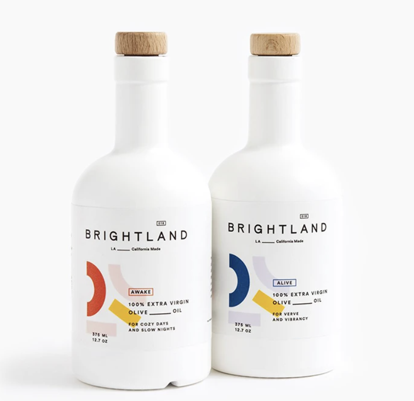 Bottles of Brightland&#x27;s Awake and Alive olive oils