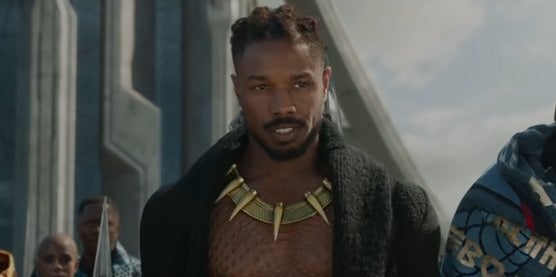 Kilmonger standing outside the palace in Wakanda with his army in &quot;Black Panther&quot;