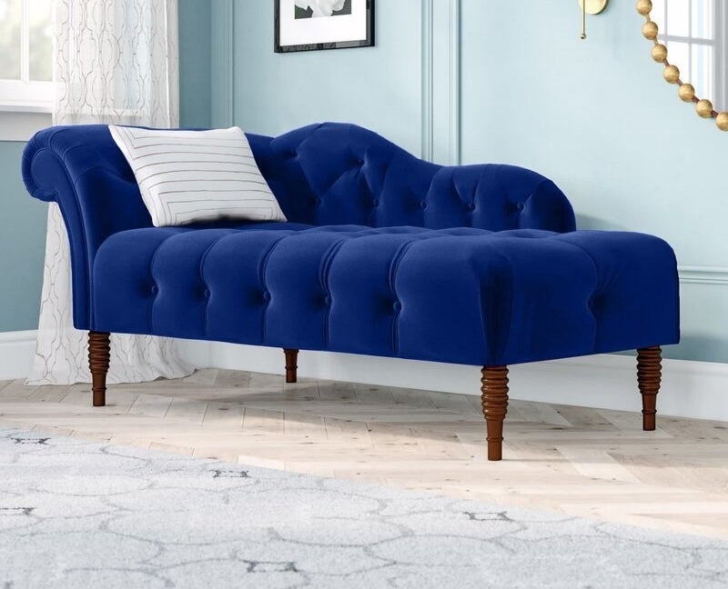 the blue chaise in a decorated room