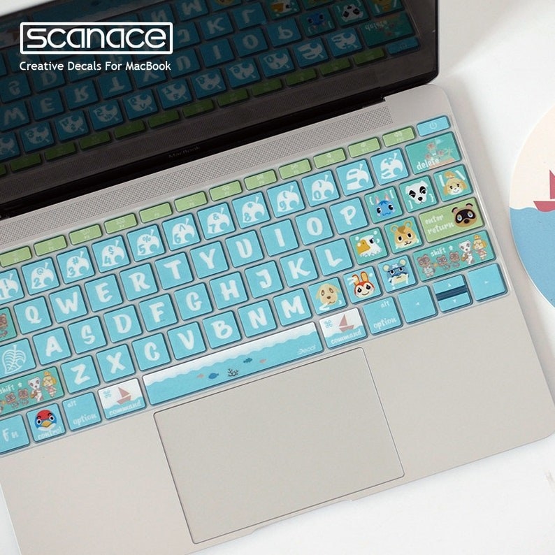 the cover, which is blue and features pictures of animal crossing characters on some of the keys