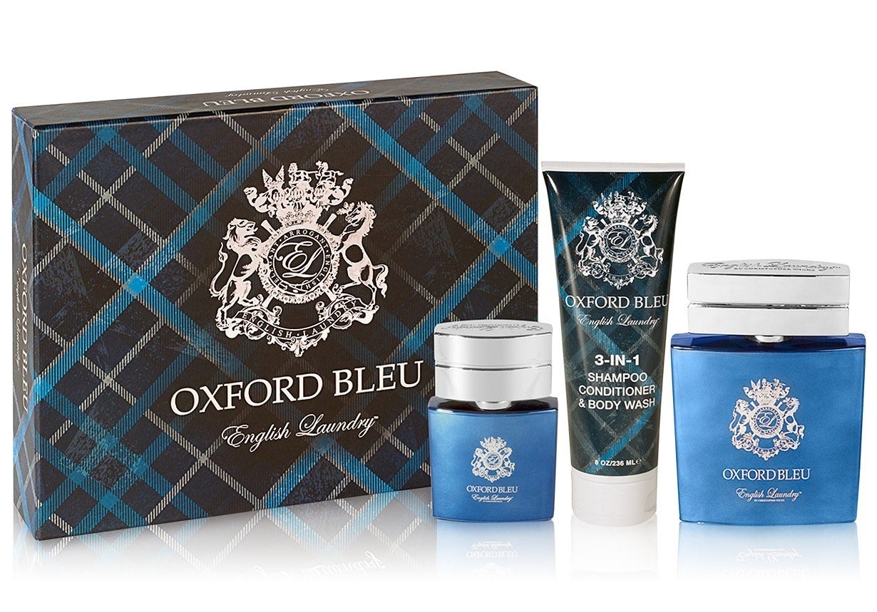 Blue, brown, and white Oxford Bleu gingham box next to blue bath set