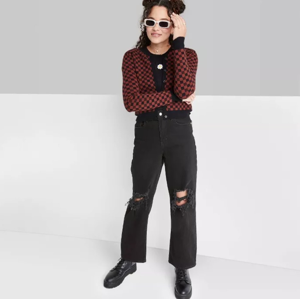 a model wearing the jeans in black