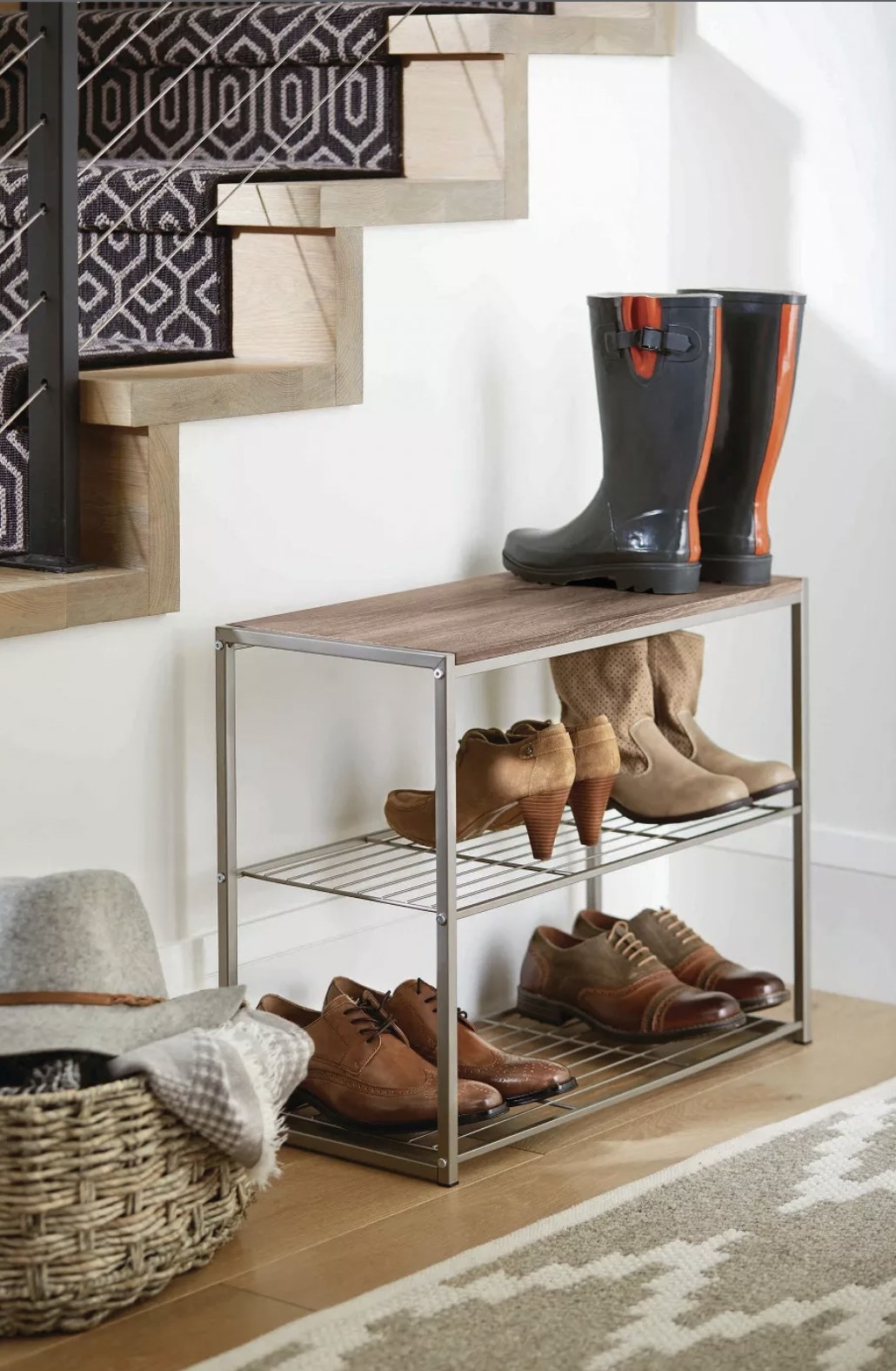The shoe rack storing dress shoes and boots