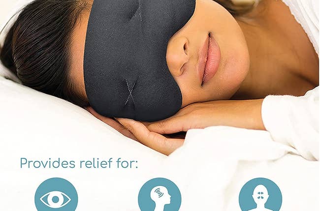 a model sleeps with the gray mask while laying down