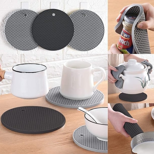 Four round honeycomb-textured silicone mats in-situ for various uses (as trivets, opening a jar, holding hot dish handles, grabbing the handle of a hot pan)
