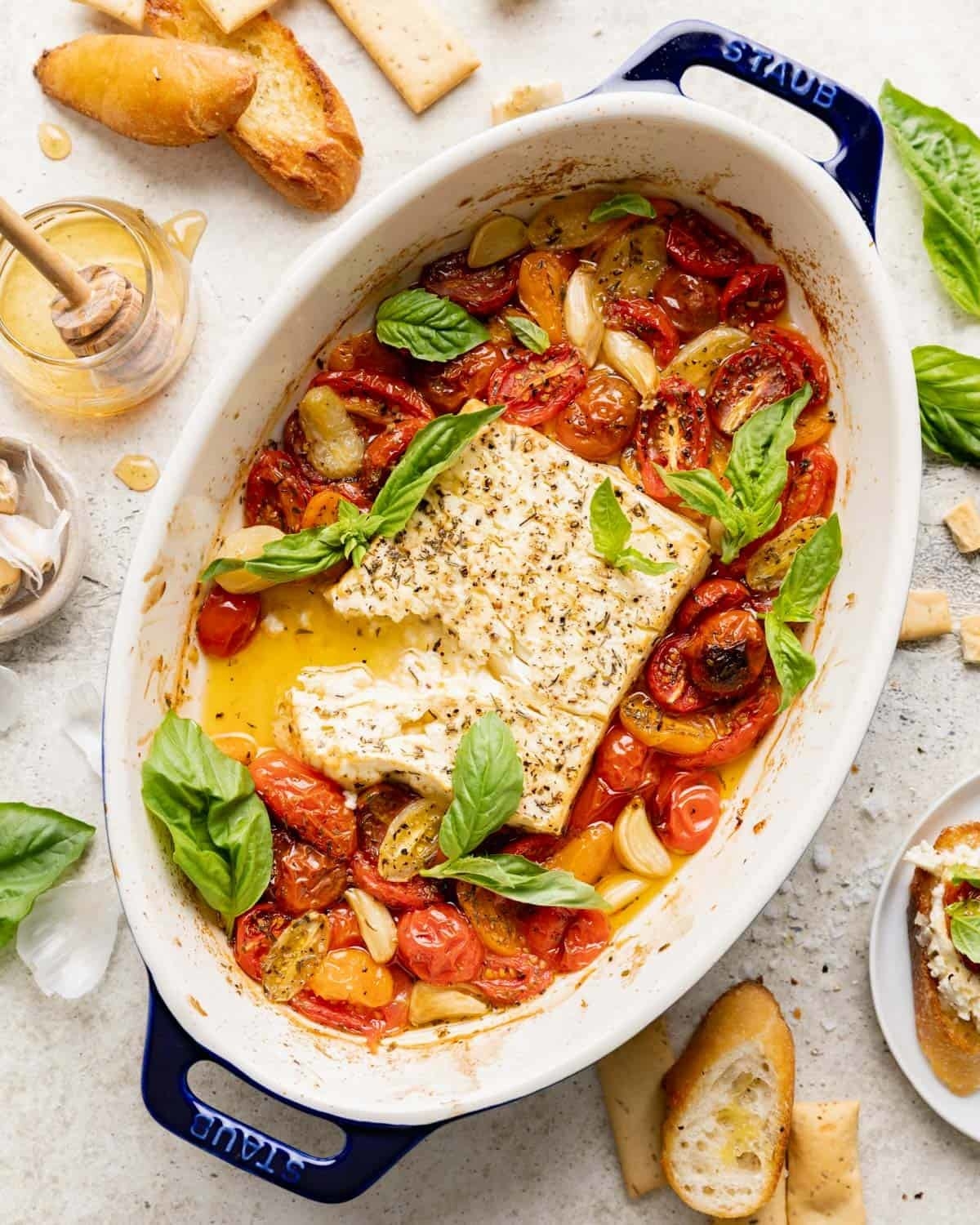 a casserole with Baked Feta Dip with Tomatoes
