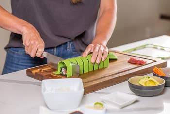 model cutting sushi pieces using the sushi making kit