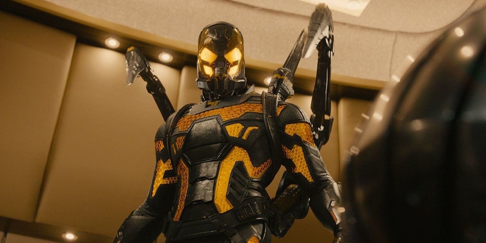 corey stoll as yellowjacket looks on, in his amazing suit