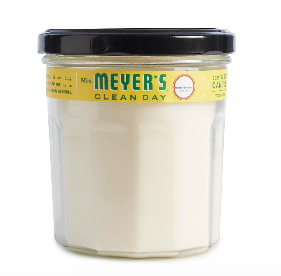 Meyer&#x27;s white jar candle with yellow label and black lid