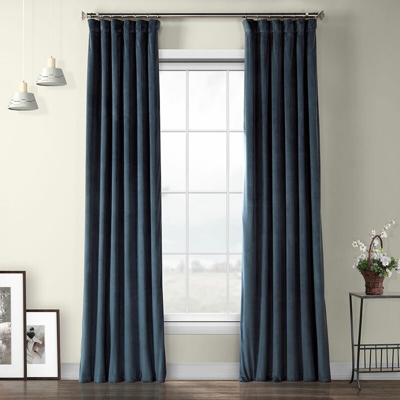 Blue curtain panels on a window