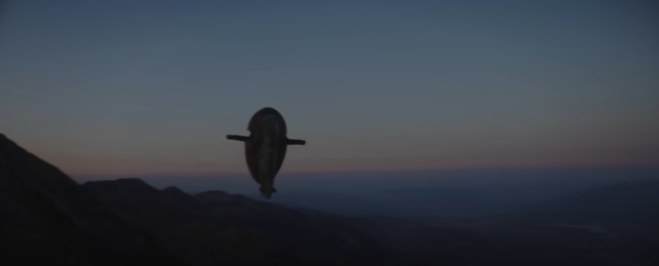 &quot;Slave I&quot; ship flying at sunset