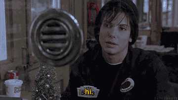 A man saying &#x27;Merry Christmas&#x27; to which a woman replies with &#x27;hi&#x27;