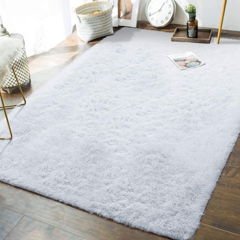 The white area rug in a living room