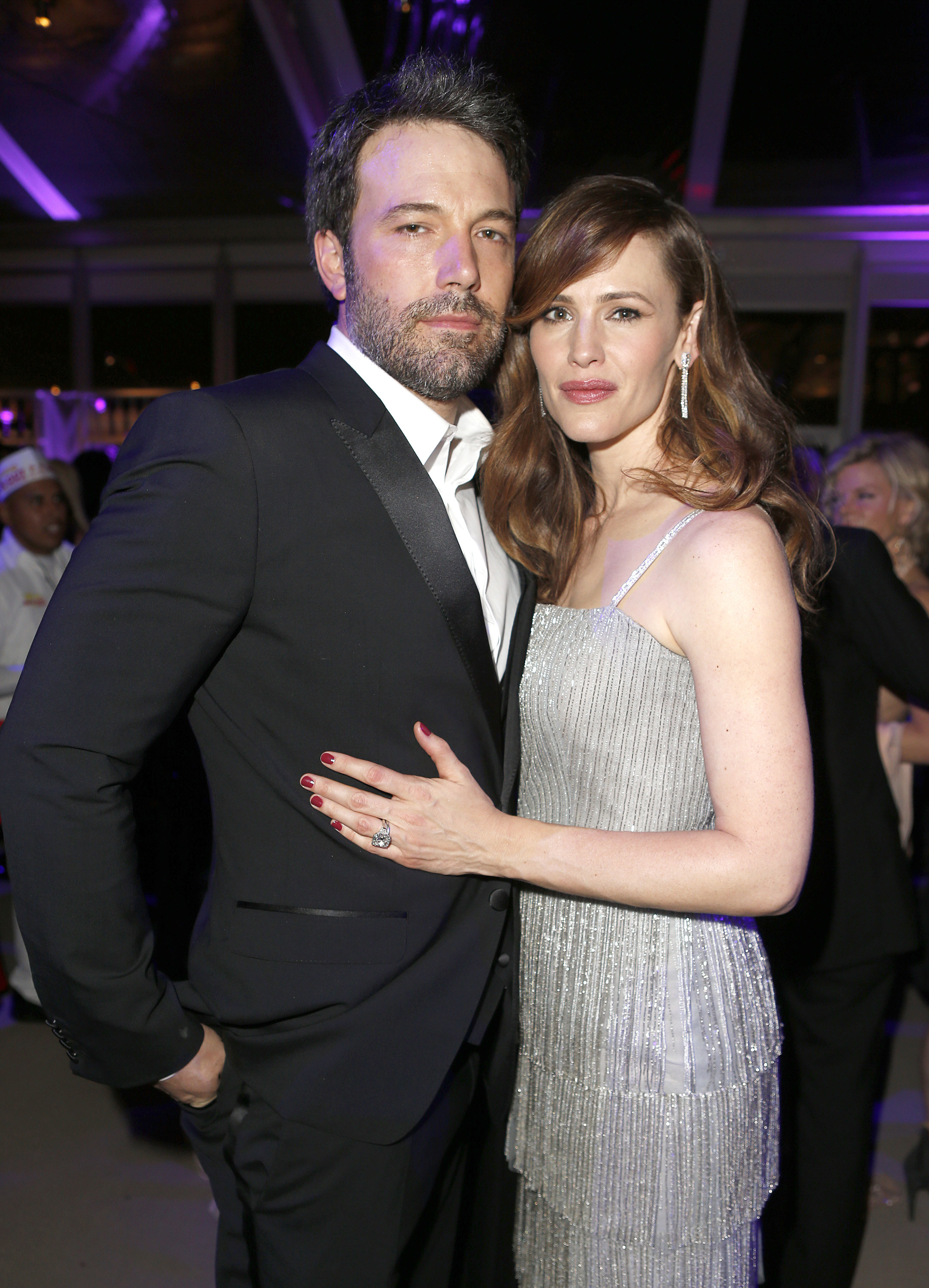 Affleck poses for a picture with Garner&#x27;s hand on his waist