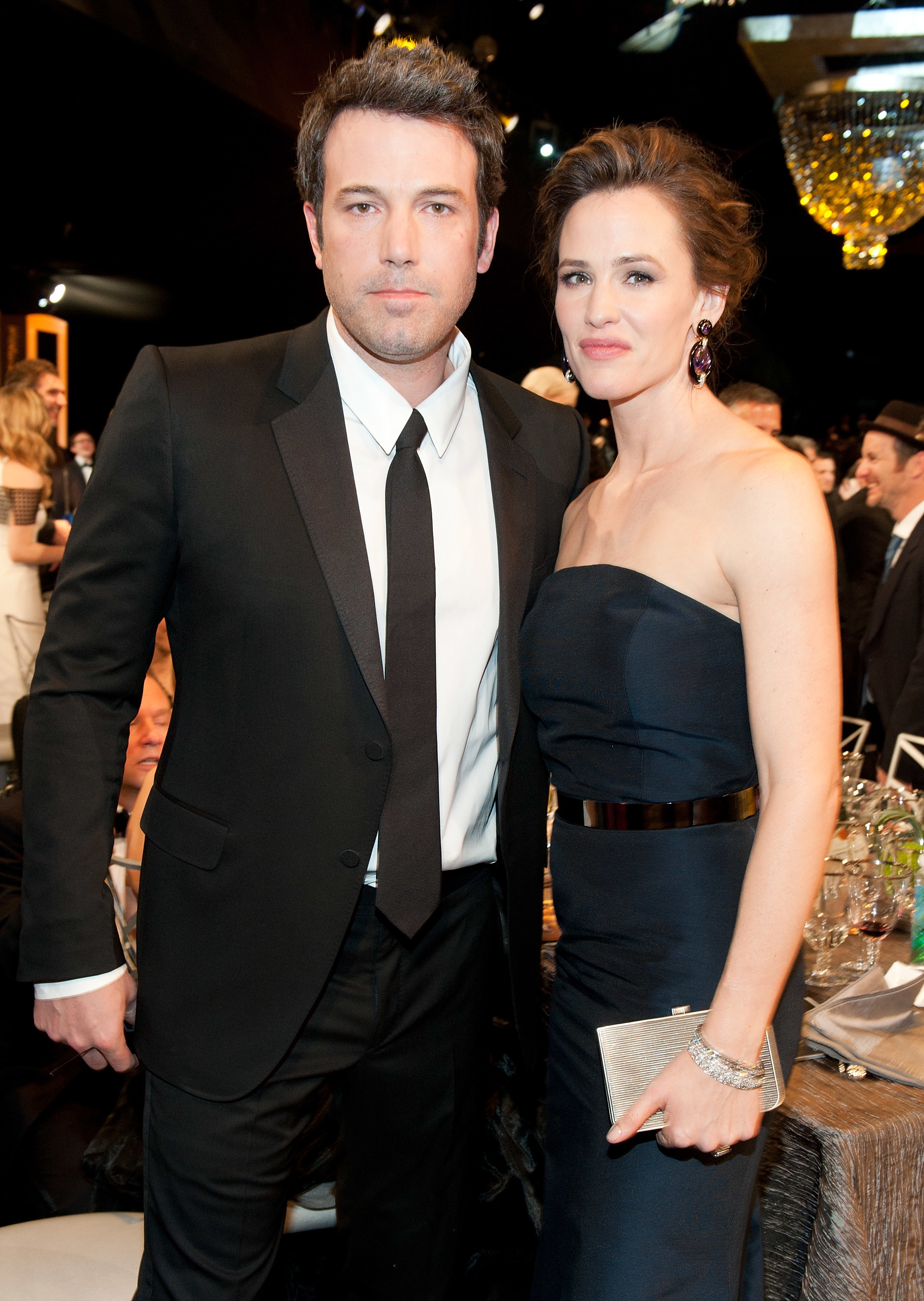 Affleck and Garner pose for a photo together at an event