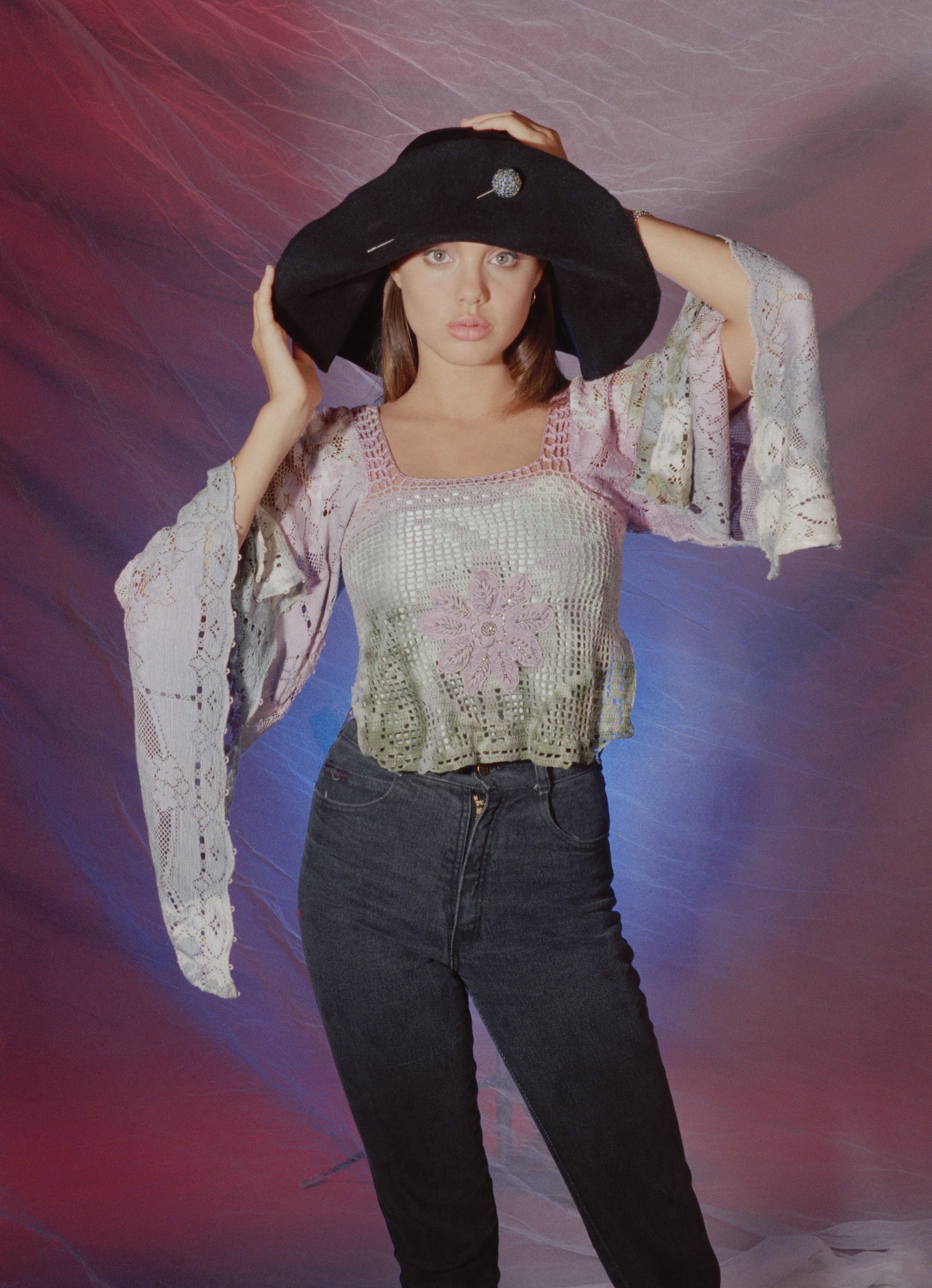 Jolie posing for a portrait in 1991
