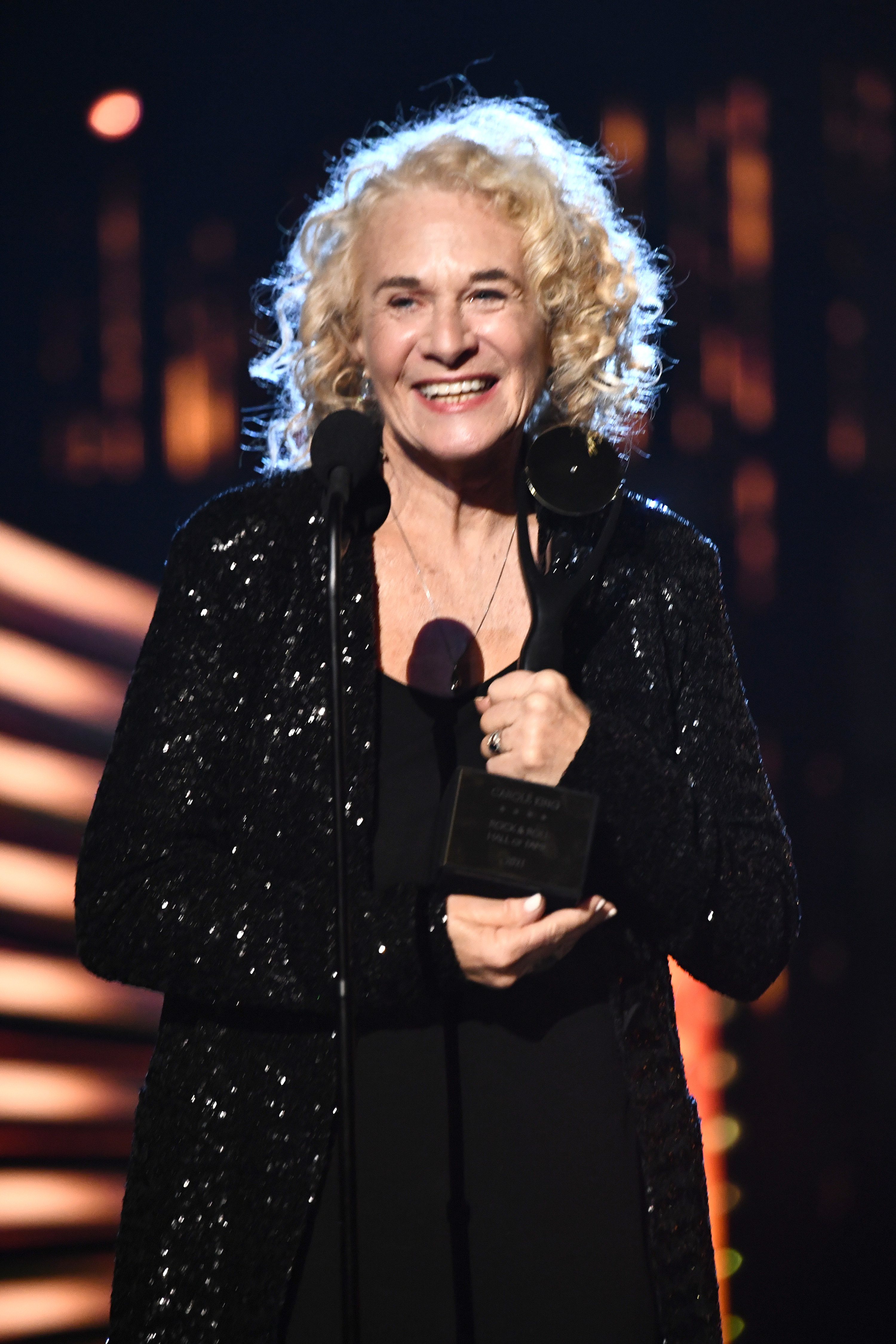 King accepting her Rock &amp;amp; Roll Hall of Fame award in 2021