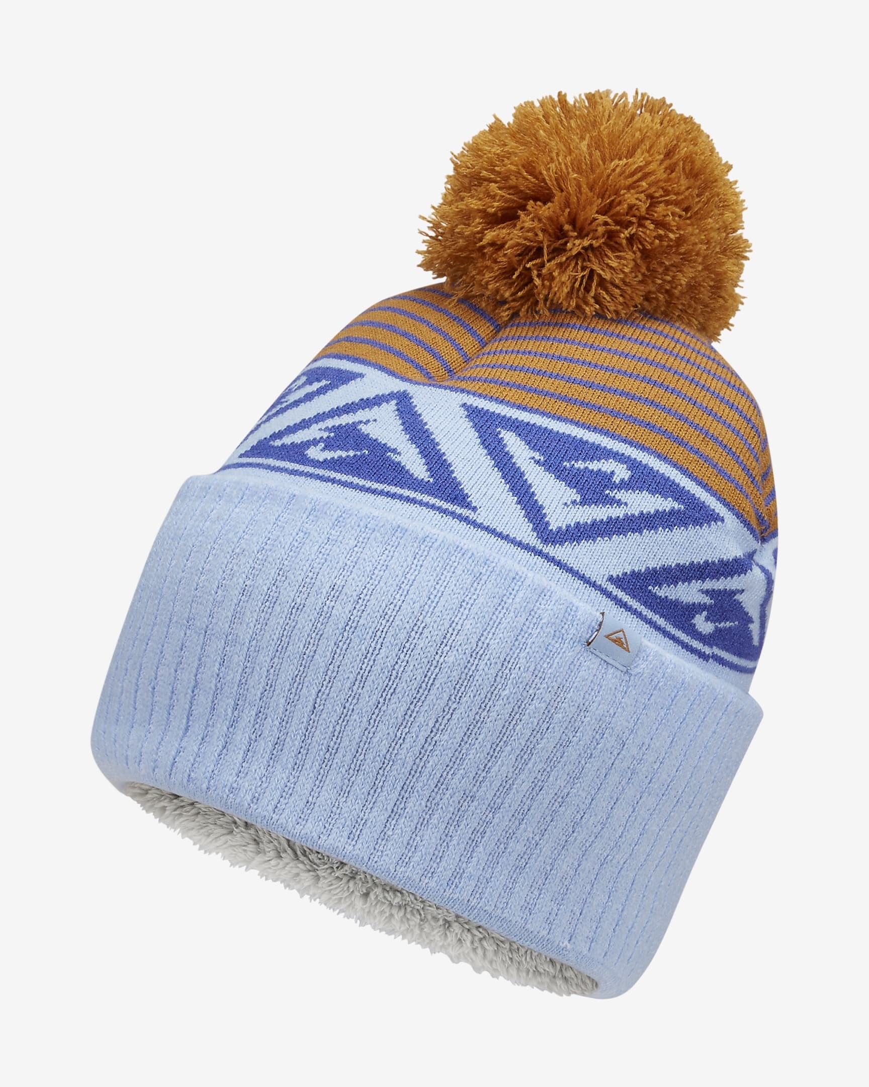 The blue and gold beanie featuring gold pom-pom and multi-patterned design