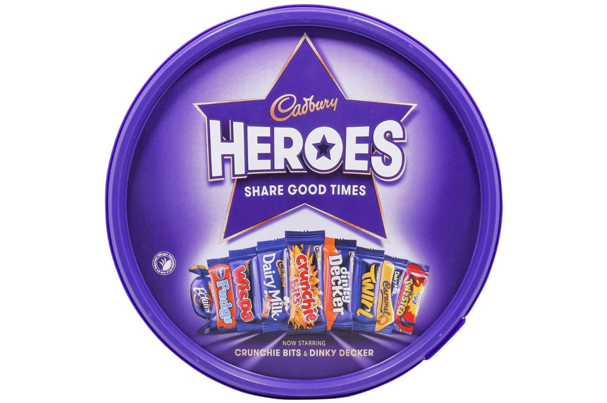 A round, purple box of chocolates called Heroes with little pictures of the chocolates that are inside.