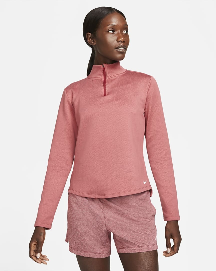 Model wearing the pink 1/2-zip fleece