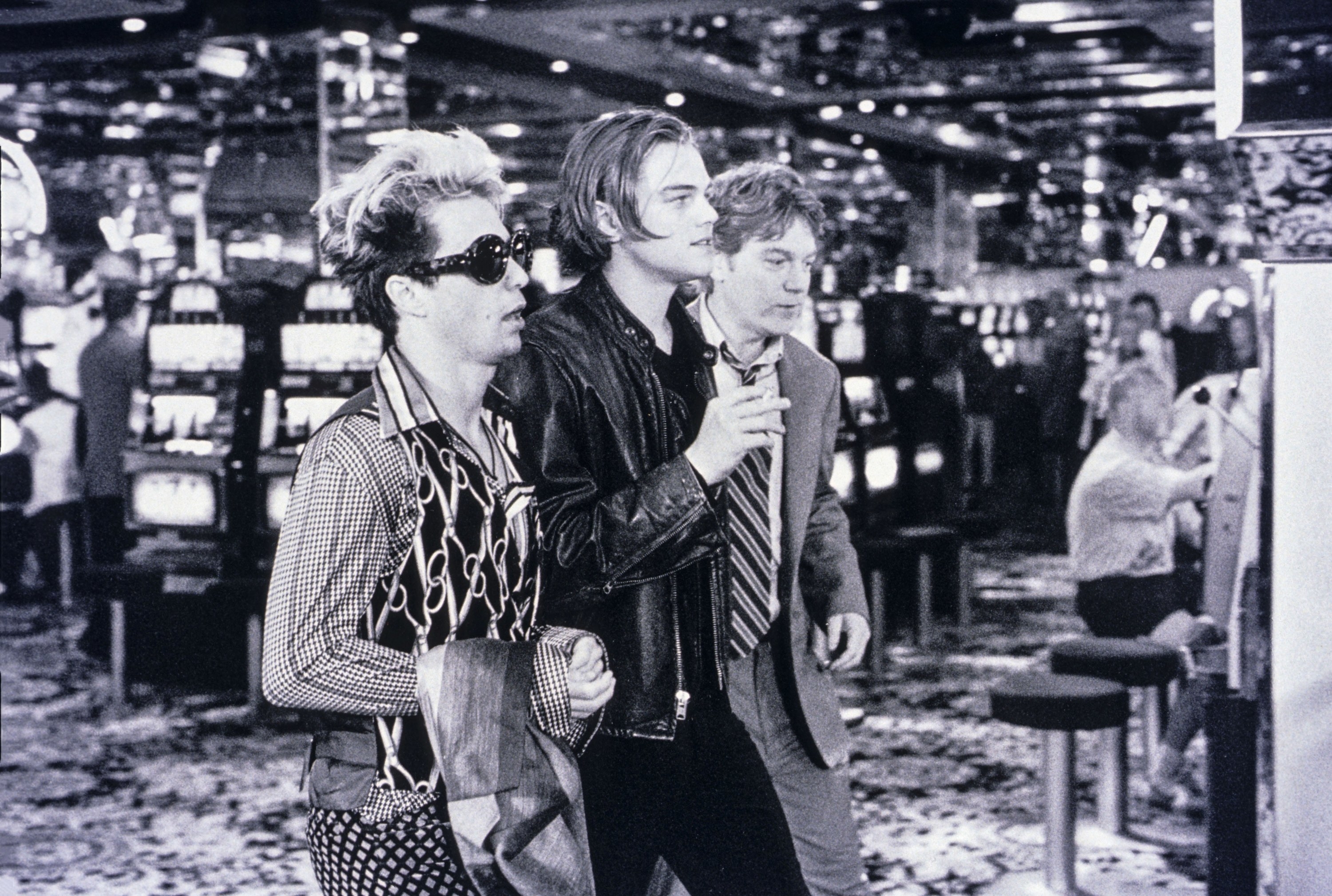 Sam Rockwell, Leonardo DiCaprio, and Kenneth Branagh walk through a casino together