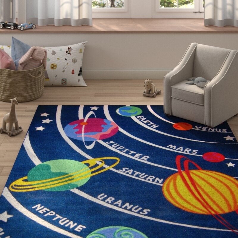 The area rug in a kid&#x27;s room.