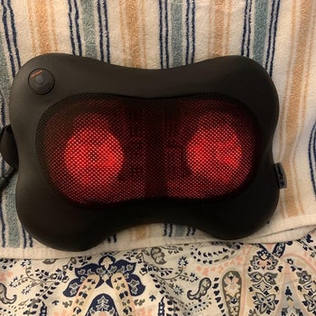 a reviewer photo of the massage on and illuminated red