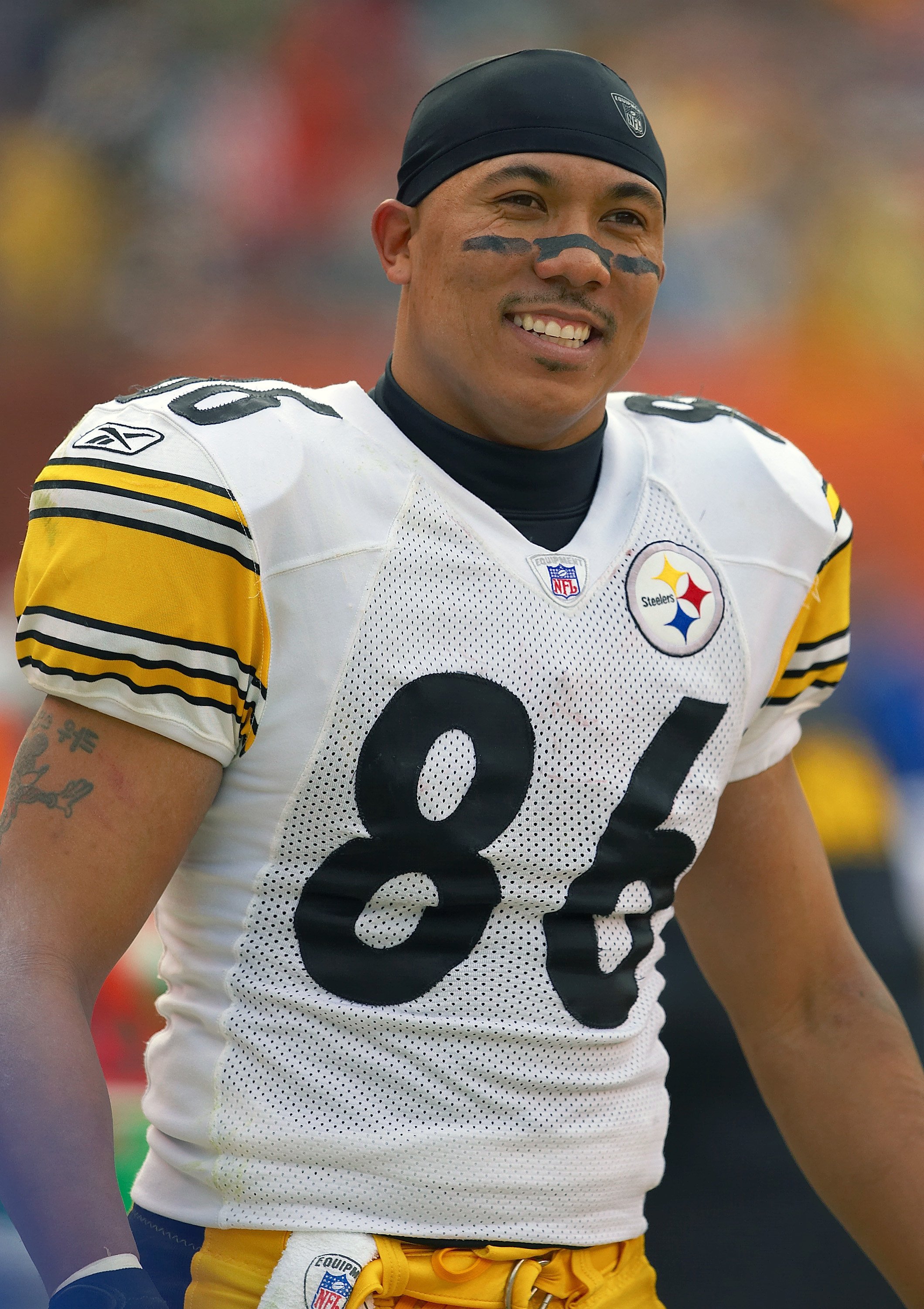 Hines Ward, number 86, on the field at a Steelers game