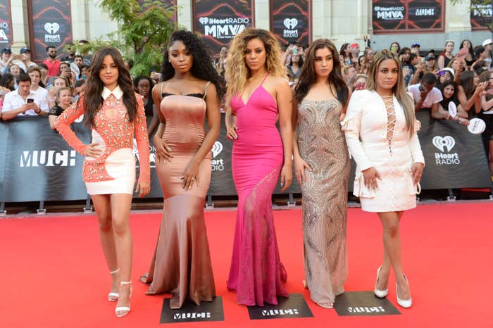 Fifth Harmony stand next to each other on the red carpet